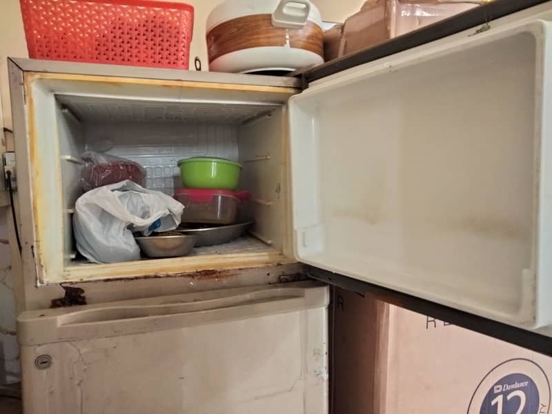 Used Dawlance refrigerator medium size 1