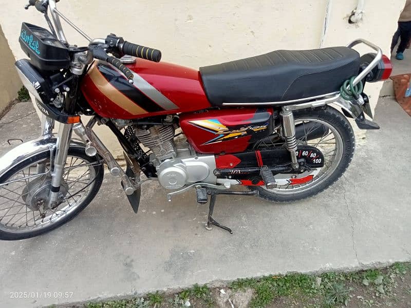 Honda 125 for sell. balck color ha 1