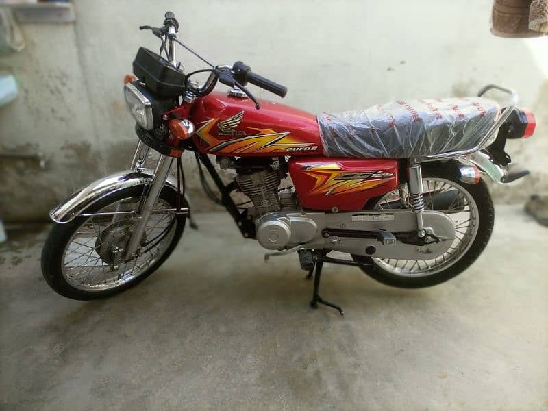 urgent sale Honda 125 red 0