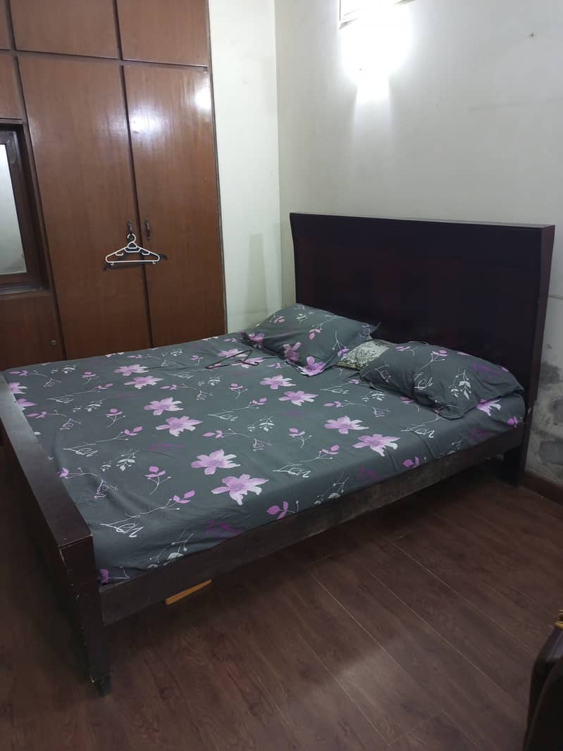 Wooden King size bed for sale 1