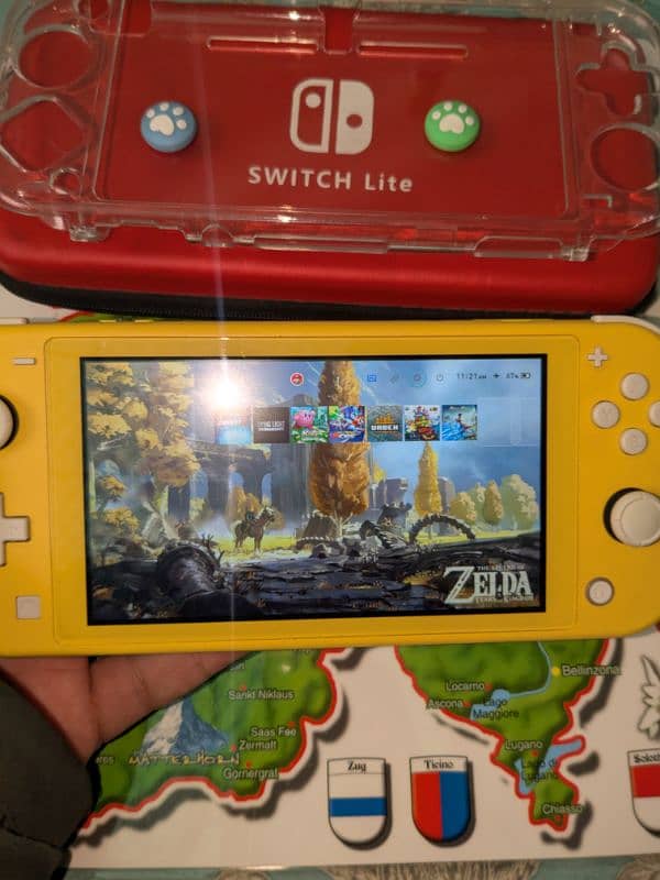 Nintendo Switch Lite Yellow Modded with 64gb Sd card 1