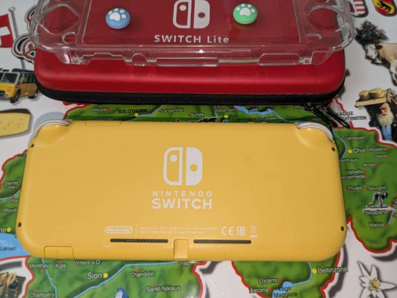 Nintendo Switch Lite Yellow Modded with 64gb Sd card 2