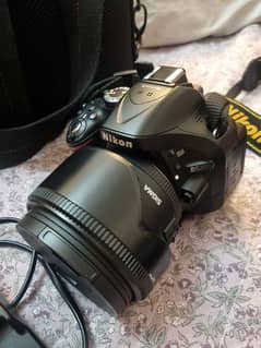 Nikon D5200 almost new,scratchles body with origional 18-55 & 18-140mm