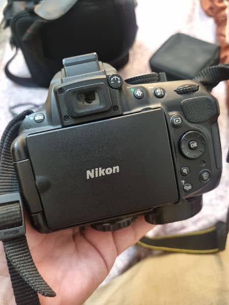 Nikon D5200 almost new,scratchles body with origional 18-55 & 18-140mm 2