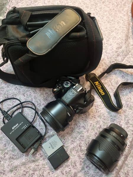 Nikon D5200 almost new,scratchles body with origional 18-55 & 18-140mm 4