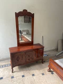 Wooden double bed with side tables and dressing table