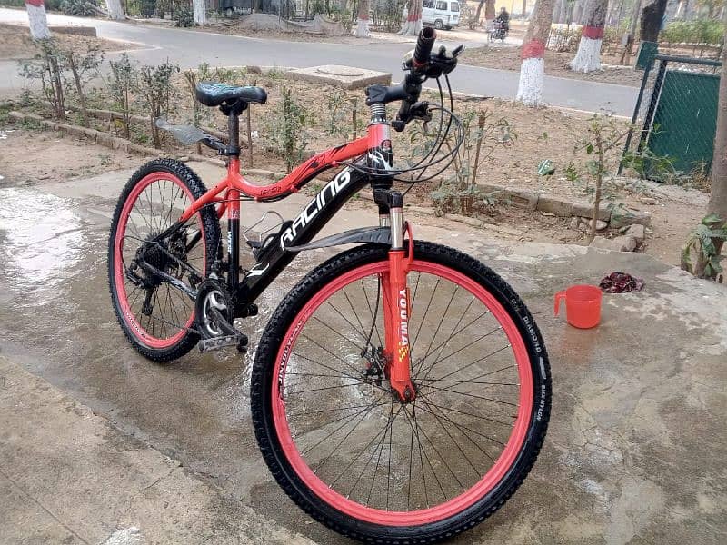 red sport bicycle 0