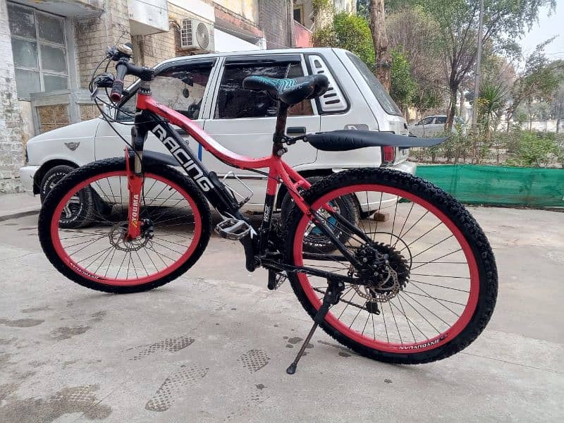 red sport bicycle 4