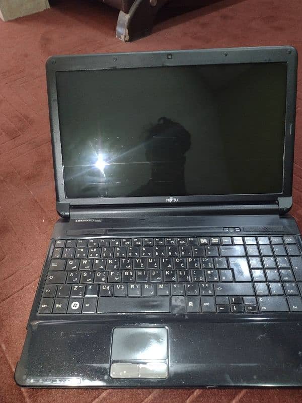 Fujitsu laptop with charger 1