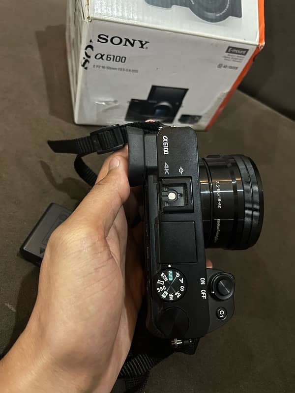 sony alpha 6100 with box kit lens and 2 batteries 1