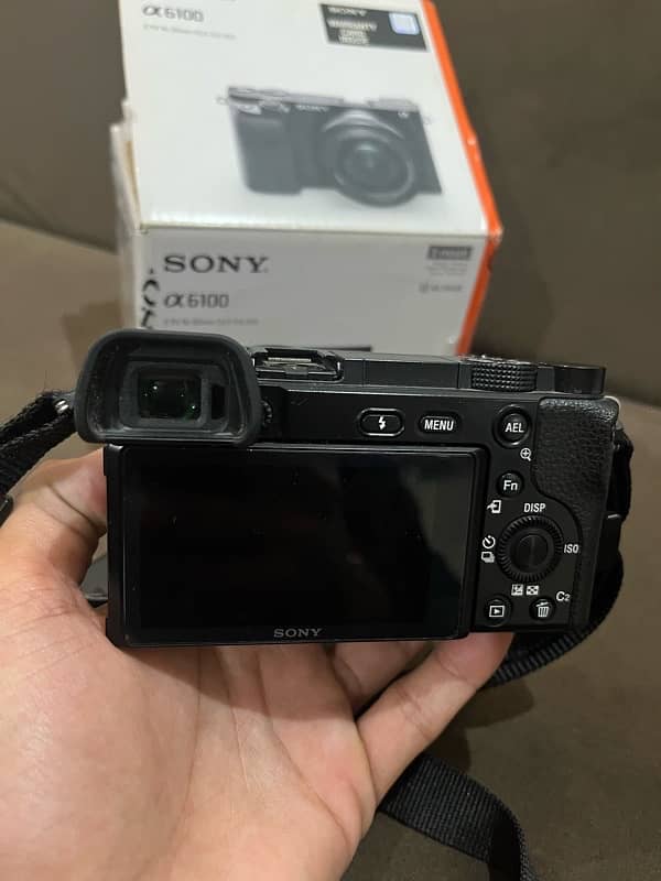 sony alpha 6100 with box kit lens and 2 batteries 8