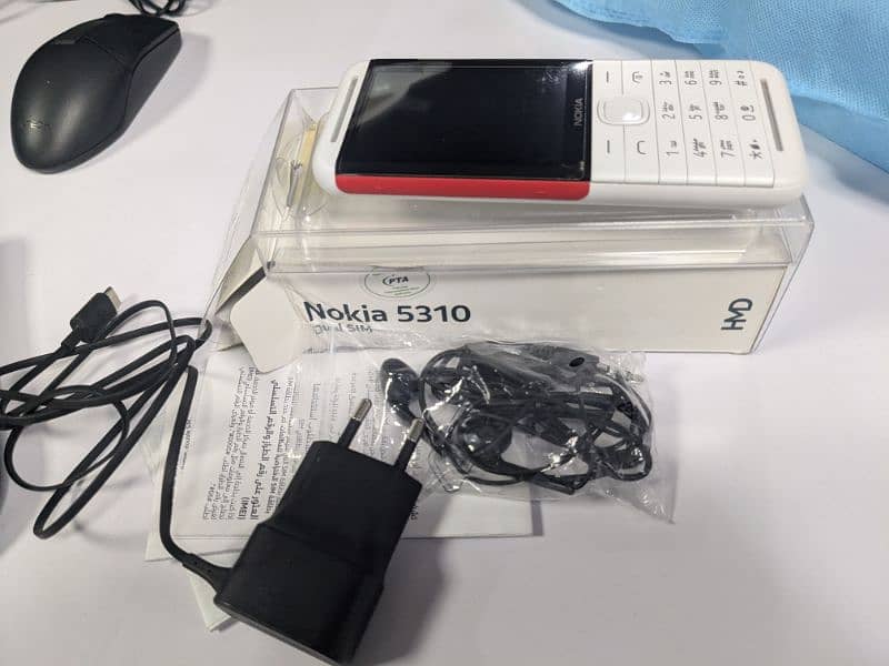 Nokia 5310 (just box open) 2