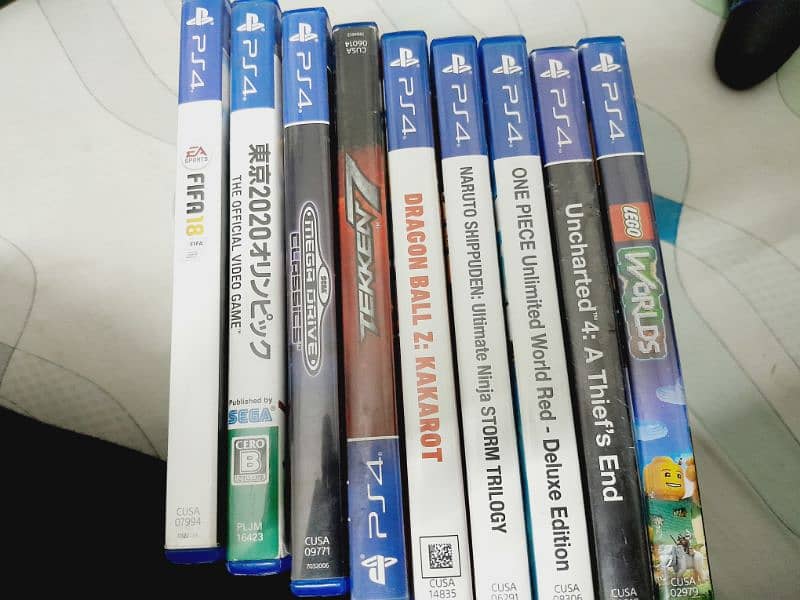 10/9 condition ps4 UK edition hardly used with 2 controller and games 5