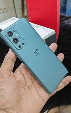 one plus 9pro. . . Pta approved. . Whatsapp number. . 03252882038