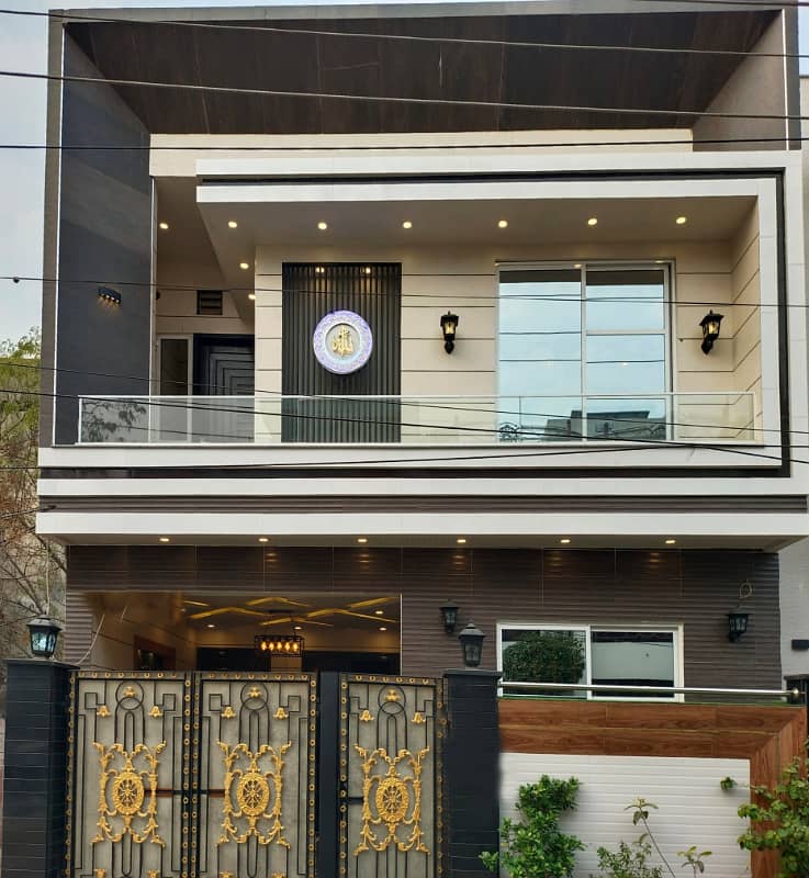 5 Marla House For SALE In Johar Town Main Kanal Road or Near Beautiful Family Park Very Beautiful Luxury Brand New Modern Design Front Elevation Super Hot Location Waliking Distance to Emporium Mall or Lahore Expo Center or Beautiful Park 0