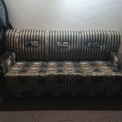 sofa set in black and golden