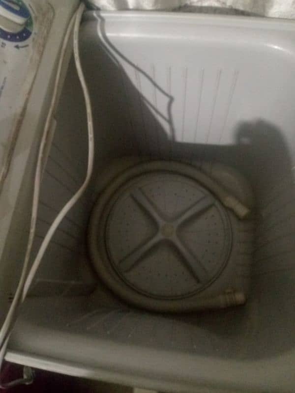 washing machine and spiner both are working condition neat and clean 1