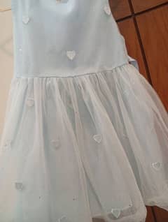 Beautiful pastel blue colour frock of baby girl