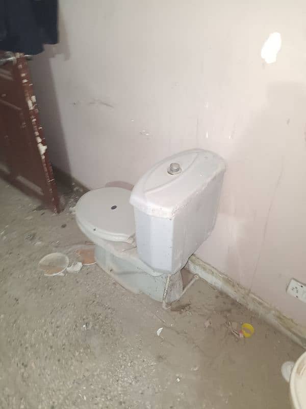 bathroom sink and English toilet. . 5k each 5