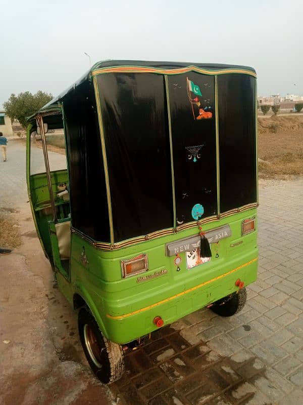 New Asia auto Rikshaw , 3 seater green color 5