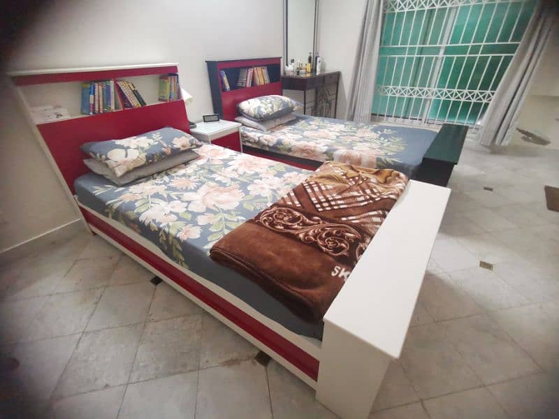 TWO SINGLE MODERN BED 1