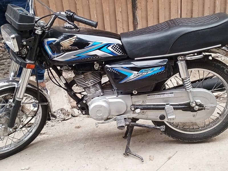 Honda 125 2023 model isb golden num 52 0