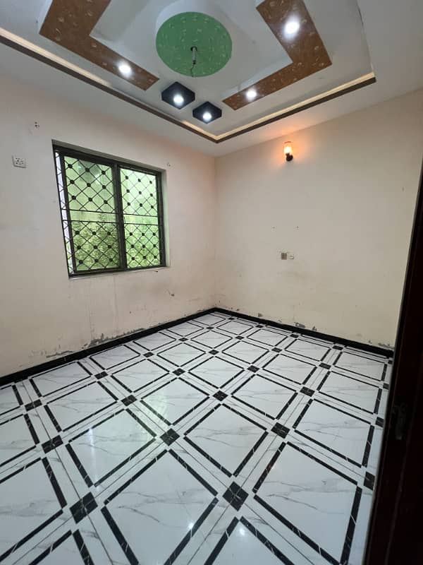 4.5 marla ground floor portion for rent first floor is locked, AL Rehman garden phase 4 main canal road Lahore 5