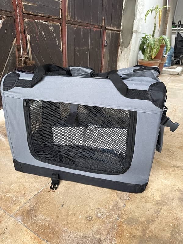 cat carrier and a beautiful bed  brand new 0