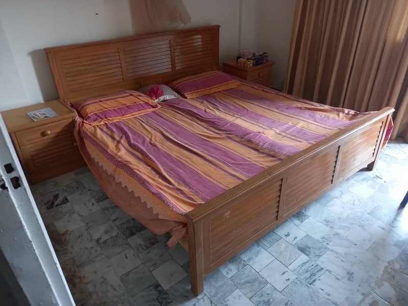 Wooden bed with side tables and wall mirror dressing 1