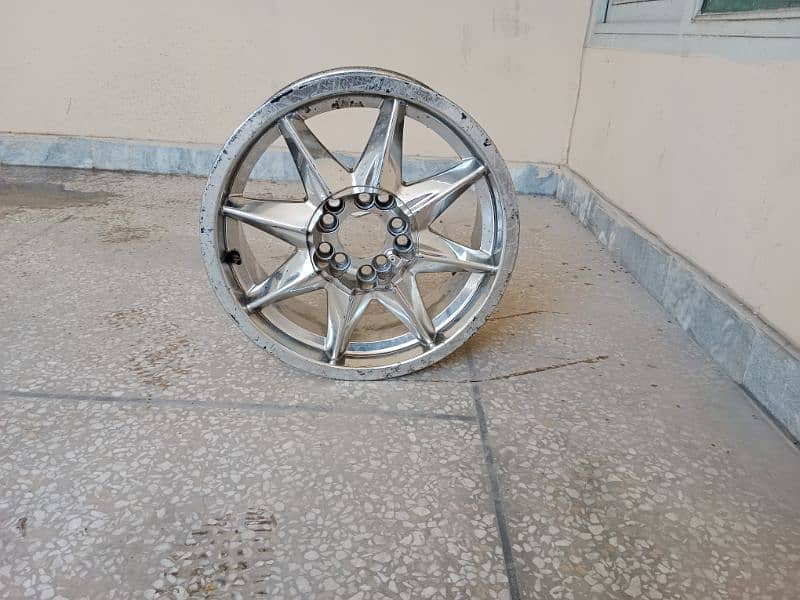 15 inch multi pcid Alloy rims 1