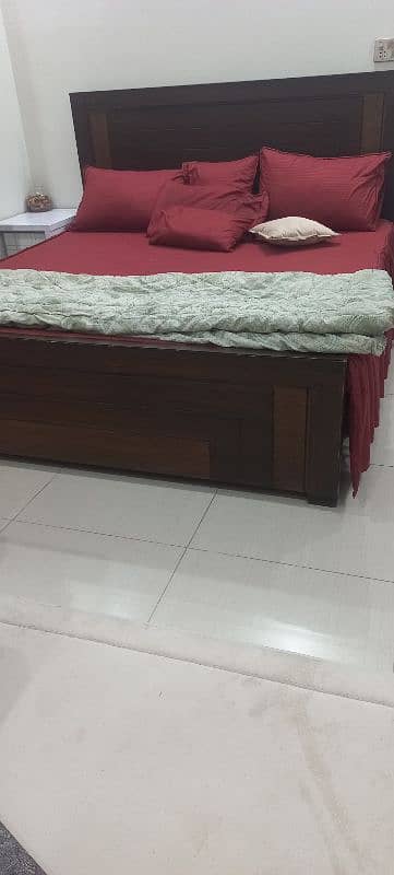 Wooden double bed 1