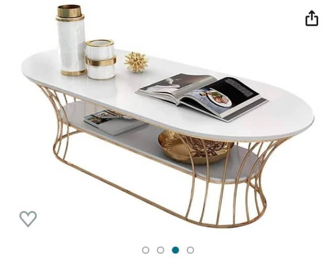 Modern center tables that will groom your drawing rooms and lounge. . . 1