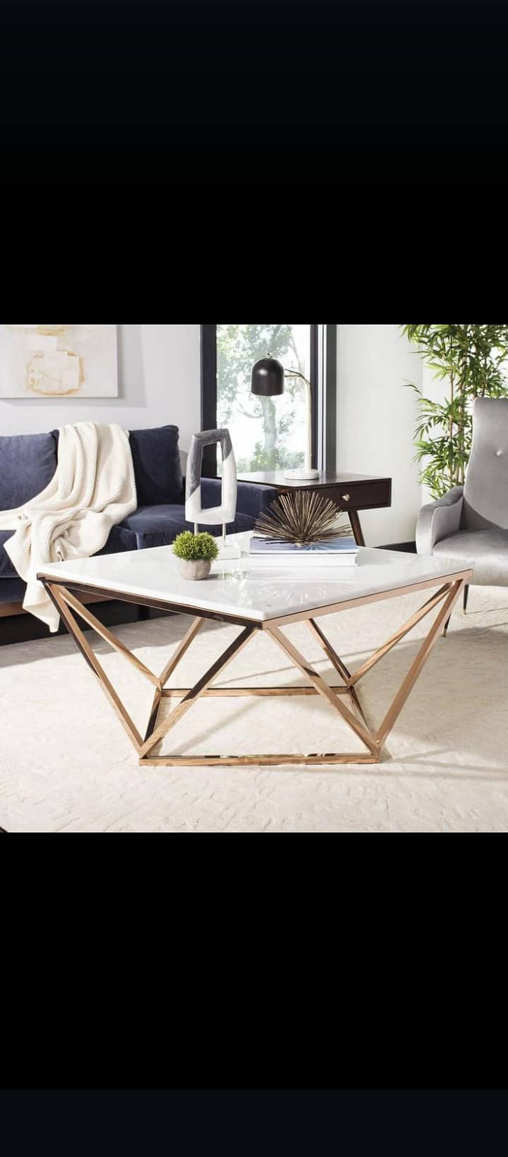 Modern center tables that will groom your drawing rooms and lounge. . . 2