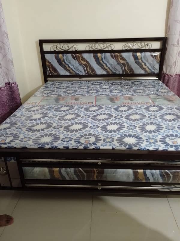 Iron bed with mattress 0