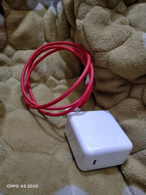 OnePlus 65 watt charger wrap charging spotted 0