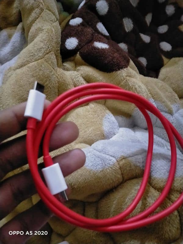 OnePlus 65 watt charger wrap charging spotted 4