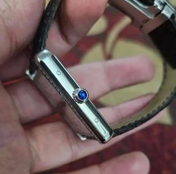 Cartier tank with after market diamond 3