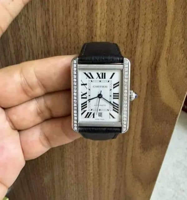 Cartier tank with after market diamond 4