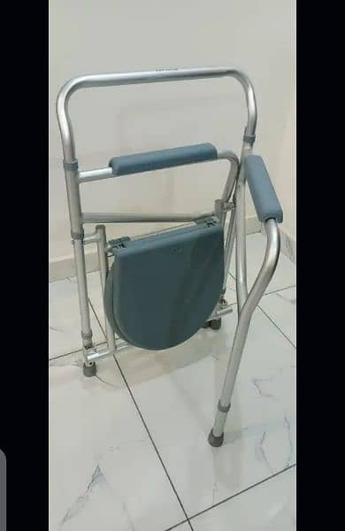 Adjustable commode chair for sale 2