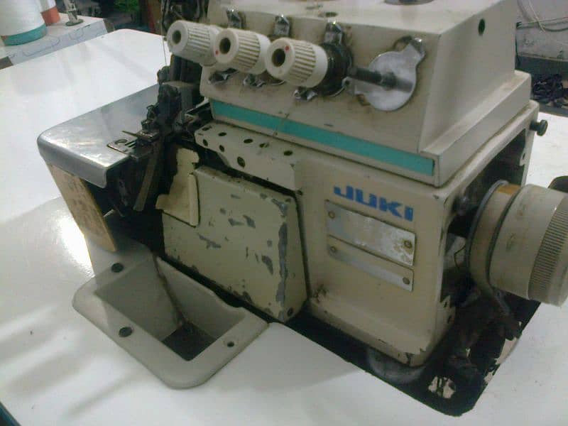 juki overlock and   peeko  RS 25000 4