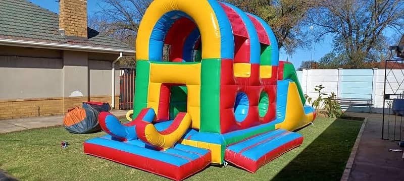 jumping castle / token ride / slide / jhuly / kiddi ride / kids / tram 5