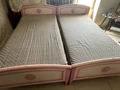 2 single beds with mattress