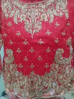 red colour bridal dress for sale in reasonable price. jusct once used