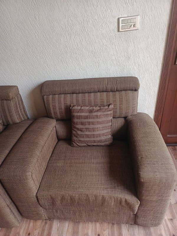 5 seater sofa  and 4 seater sofa . . center table 0