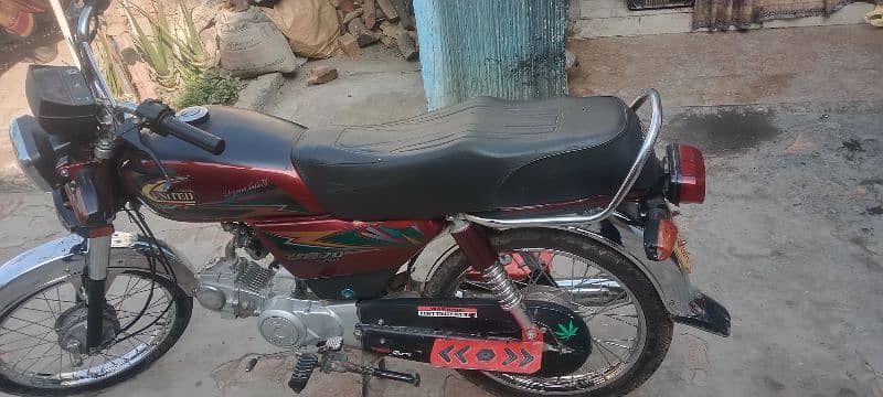 United 70cc 4