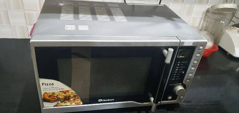 microwave oven Dawlance same like new 10/9.5 condition 0