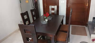 Six seat dining table and chairs (excellent condition. big discount)