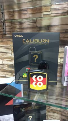 Koko Caliburn Device box packed witb 2 extra coils