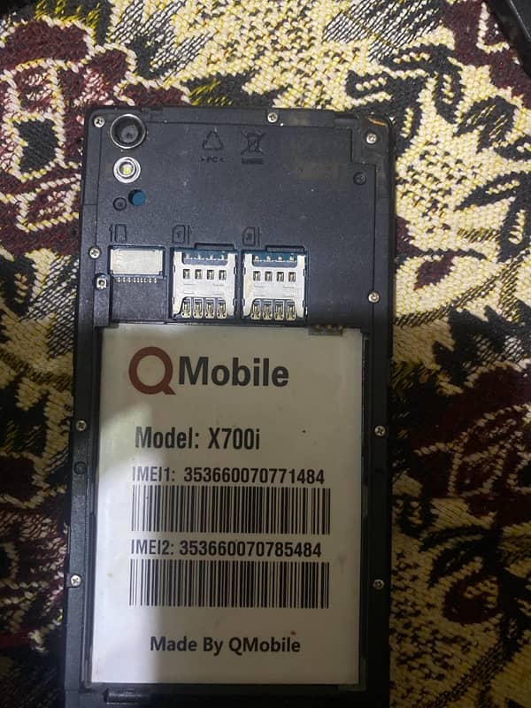 Q mobile x700i 0