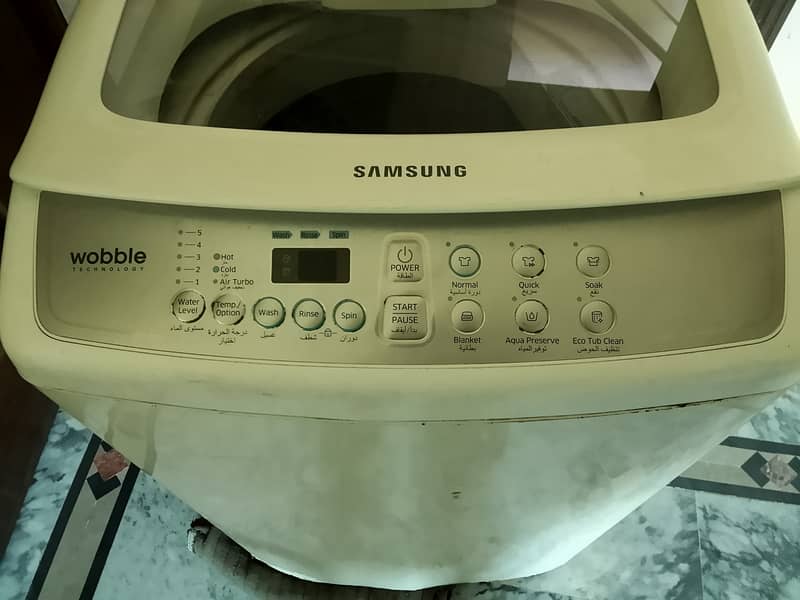 Samsung Fully Automatic Top Load Washing Machine (Model: WA70H4200SW) 5